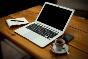 Laptop_with_coffee_on_office_desk_free_retro_vintage_wallpapers_download